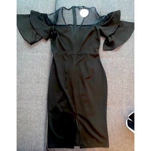 Black dress size Medium by: Victoria’s Botique